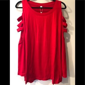 Sexy long sleeve top w/shoulder & sleeve cut-outs, comfy & versatile